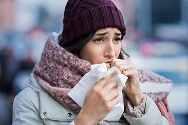 Woman-with-a-cold-iStock-831416202.jpg